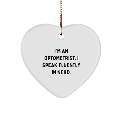 Funny Optometrist Gifts from Friends - Heart Ornament with 'I'm An Optometrist. I Speak Fluently In genius.' Quote for Christmas - Image 1