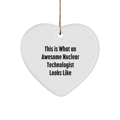 Funny Gift for Nuclear Technologist, Heart Ornament with 'This Is What An Awesome Nuclear Technologist Looks Like' Quote, Gifts from Family to Nuclear Technologist, Unique Christmas Unique Gifts - Image 1